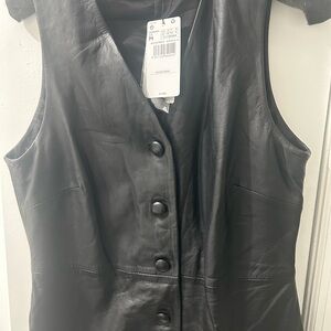 Mango short genuine leather sleeveless dress. Can be worn as a dress or a vest.